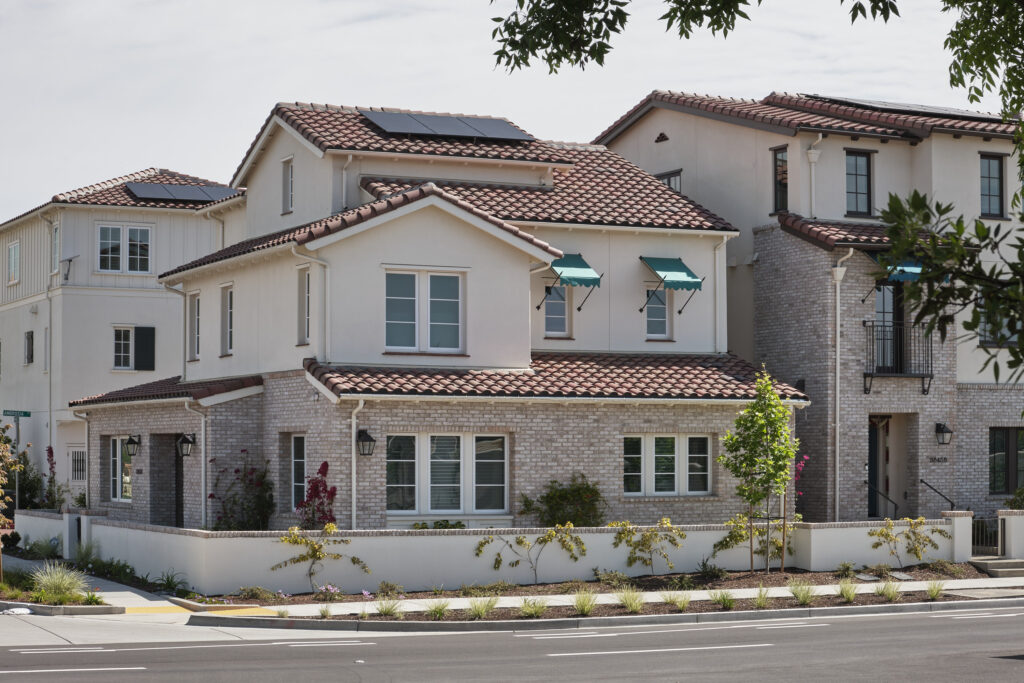 Exterior corner detail with solar panels and awning at Marabel in Newark, CA