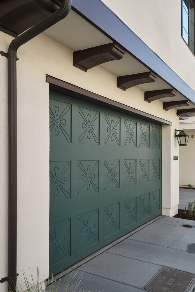 Decorative teal garage door detail at a Marabel home in Newark, CA