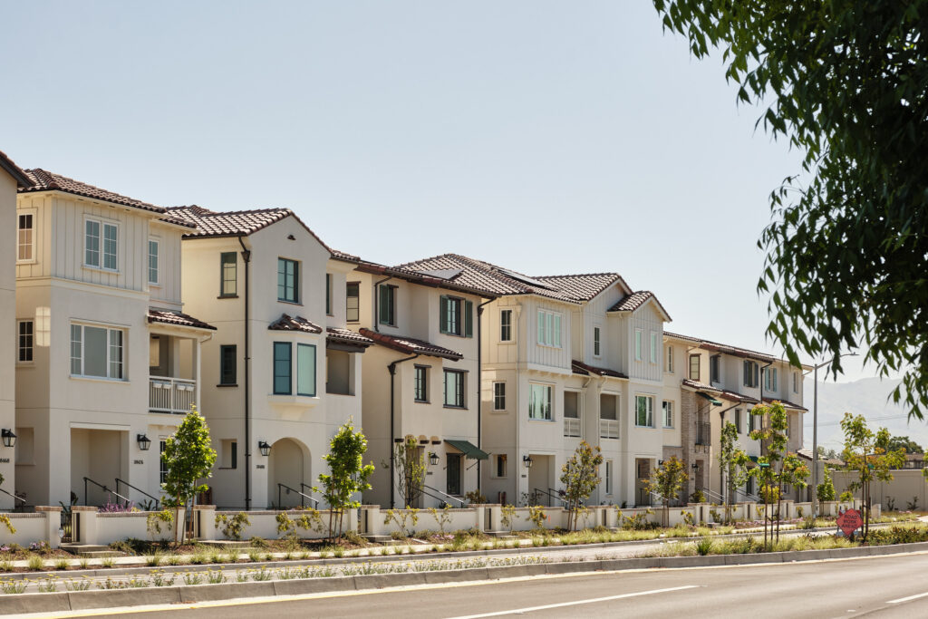 Wide street view of the Marabel townhome community in Newark, CA
